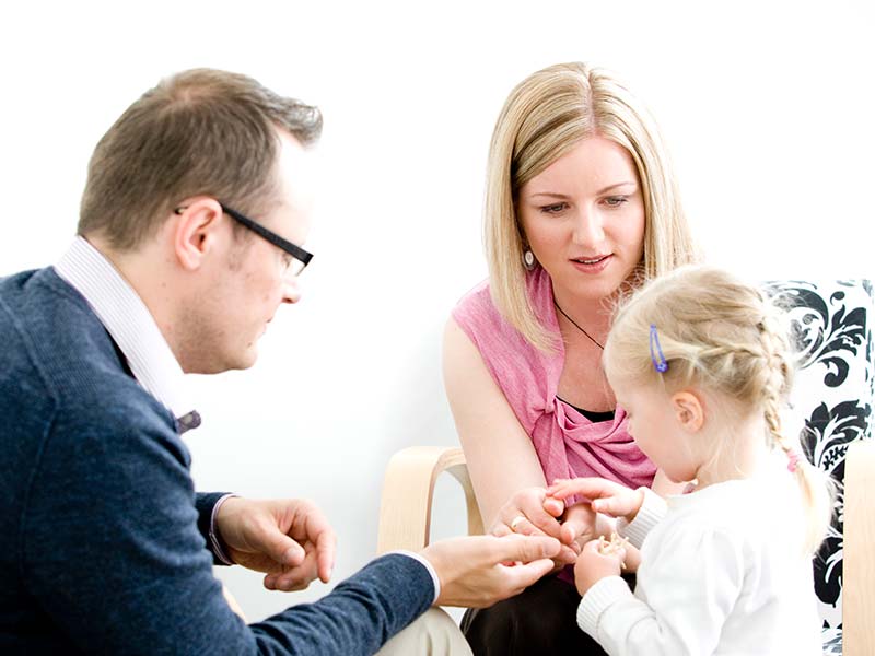 Kerstin consulting with a family